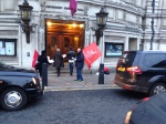 Leafleters with flags outside BITC summit